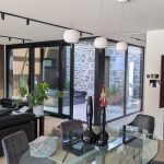 Rénovation d’une habitation existante et création d’une extension - projet à Saint-Renan dans le Finistère en Bretagne. Projet réalisé par l'Atelier Cédric Didat